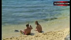 2. Agnes Soral Topless on Beach – Un Moment D'Egarement