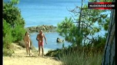 4. Agnes Soral Topless on Beach – Un Moment D'Egarement