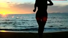10. Dona Speir Nude on Beach – Savage Beach