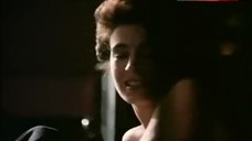 2. Sean Young Nude on Bed – Blue Ice