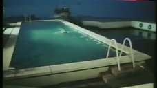 1. Belinda Mayne Nude Swimming in Pool – White Fire