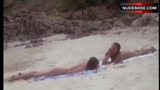 1. Emmanuelle Beart Naked on Beach – Premiers Desirs