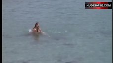 9. Emmanuelle Beart Naked on Beach – Premiers Desirs