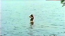 7. Kathleen Beller Shows Full Naked in Lake – Surfacing