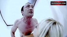 89. Lauren Lakis Laying Nude on Table – Gun Woman