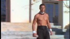 6. Michelle Bauer Swims Topless in Pool – Bikini Drive-In