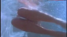 8. Michelle Bauer Swims Topless in Pool – Bikini Drive-In