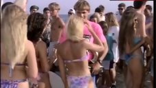 56. Elizabeth Berkley Sexy in Black Bikini – Baywatch