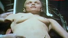 2. Renee Soutendijk Topless on Table – Eve Of Destruction