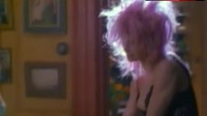 10. Carole Bouquet Sexy in Black Corset – A Business Affair