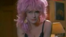 8. Carole Bouquet Sexy in Black Corset – A Business Affair