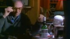 9. Carole Bouquet Sexy in Black Corset – A Business Affair