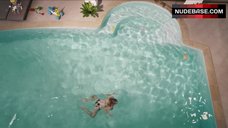 7. Natalie Lorence Swims in Bikini – Zero Tolerance