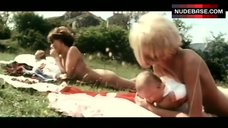 4. Mireille Darc Nude Sunbathing – Fleur D'Oseille