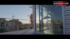 2. Jessica Farrow Nude on Balcony – Knight Of Cups
