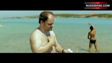 5. Elli Tringou Topless on Beach – Suntan