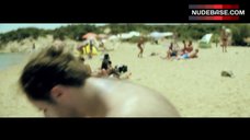 6. Elli Tringou Topless on Beach – Suntan