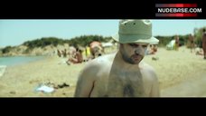 7. Elli Tringou Topless on Beach – Suntan