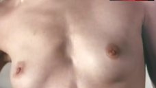 2. Beth Broderick Boobs Scene – Breast Men