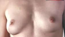 6. Beth Broderick Boobs Scene – Breast Men