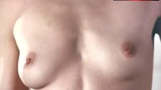 7. Beth Broderick Boobs Scene – Breast Men