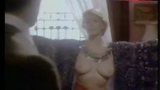 3. Ellen Burstyn Shows Breasts – The Ambassador