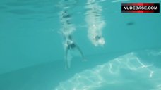 1. Hande Kodja Swims in Pool – The Unlikely Girl