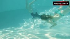 2. Hande Kodja Swims in Pool – The Unlikely Girl