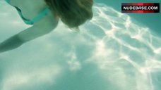 4. Hande Kodja Swims in Pool – The Unlikely Girl