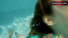 6. Hande Kodja Swims in Pool – The Unlikely Girl