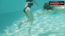 9. Hande Kodja Swims in Pool – The Unlikely Girl