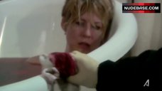 1. Jenna Elfman in Bathtub – Damages