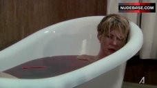 2. Jenna Elfman in Bathtub – Damages