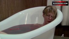 5. Jenna Elfman in Bathtub – Damages