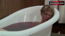 6. Jenna Elfman in Bathtub – Damages