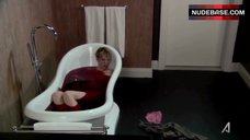 9. Jenna Elfman in Bathtub – Damages