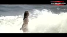 4. Anouk Aimee Naked on Beach – Justine