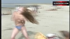 3. Isild Le Besco Topless on Beach – Girls Can'T Swim