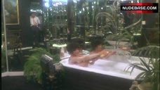 2. Joan Collins Nude in Bath Tub – The Bitch