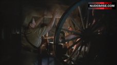 1. Roberta Collins Topless Tied to Wheel – Women In Cages