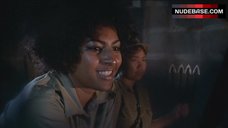 2. Roberta Collins Topless Tied to Wheel – Women In Cages