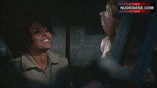 6. Roberta Collins Topless Tied to Wheel – Women In Cages