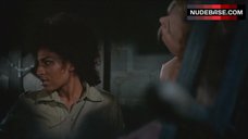 9. Roberta Collins Topless Tied to Wheel – Women In Cages