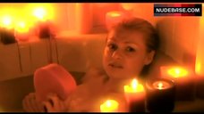 6. Portia De Rossi Lying Naked in Bath Tub – Women In Film