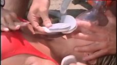 8. Nicole Eggert Unconscious on Beach –Baywatch