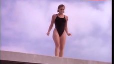8. Nicole Eggert Hot in Black Swimsuit – Baywatch