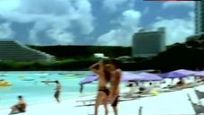 4. Carmen Electra in Bikini on Beach – Max Havoc: Curse Of The Dragon