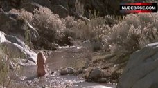 3. Cynthia Thompson Washes Herself in Stream – Cave Girl