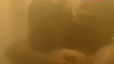 10. Saffron Burrows Shows Nude Ass – Tempted