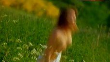 7. Vanessa Paradis Shows Nude Boobs in the Field – Noce Blanche